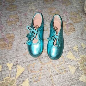 Lmdi collection metallic blue tassel flat sz 26/9-9.5